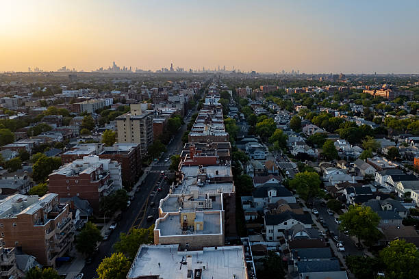 istock Tall buildings and lush trees in a bustling cityscape. 2219169191