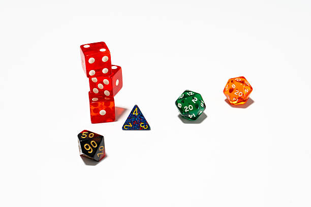 istock Colorful dice collection on a white backdrop, perfect for a game night setting. 2219173544