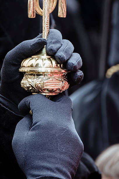 Zamora, Spain, March 29th, 2024: The Silent Bearer: Hands that Uphold Zamora's Ancient Faith