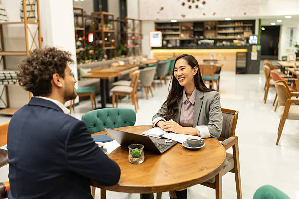 istock Business people having a meeting at a cafe restaurant 2219177144