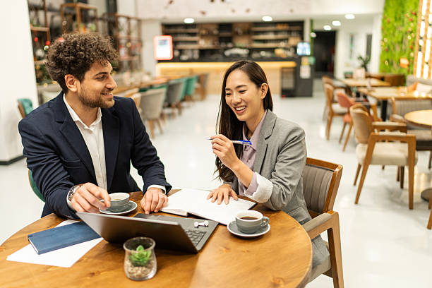 istock Business people having meeting in cafe restaurant 2219178729