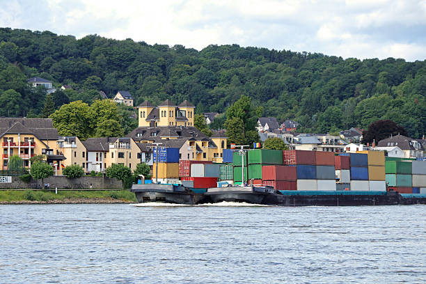 Barges carrying many containers on the Rhine in Germany.