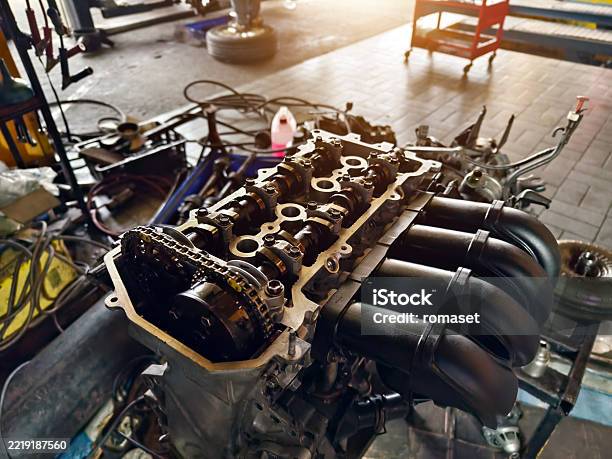 Normal Engine Inside A Car Engine Is Being Worked On Inside A Garage Workshop Stock Photo ...