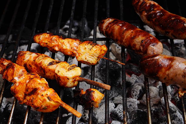 Some pieces of meat on a barbecue
