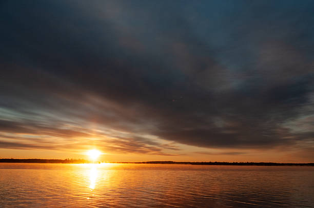 istock Sunrise over a beautiful Canadian Lake 2219193768