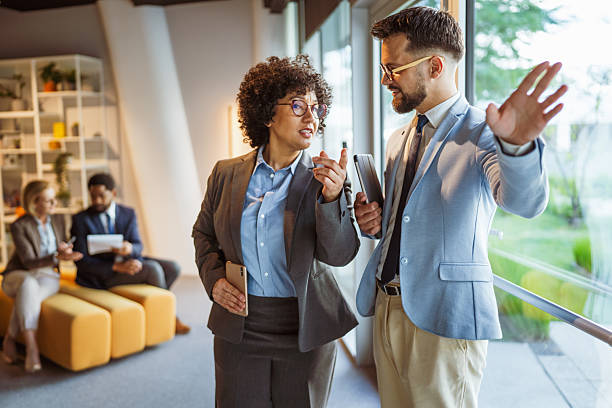 istock happy diverse business team people work and talk in corporate office 2219203664
