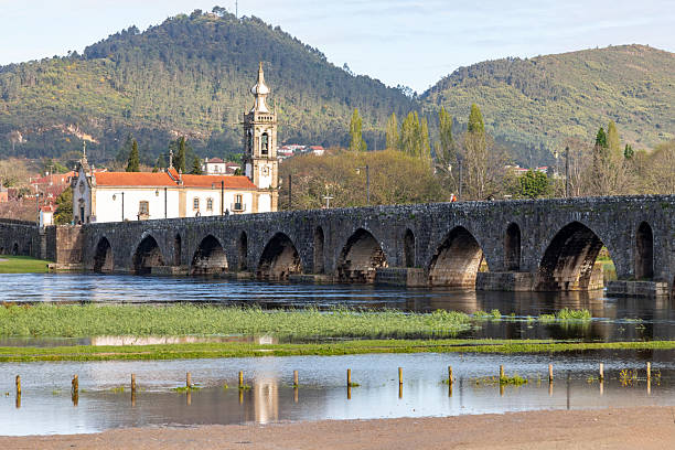 istock Medieval bridge and Church in Ponte de Lima 2219204099
