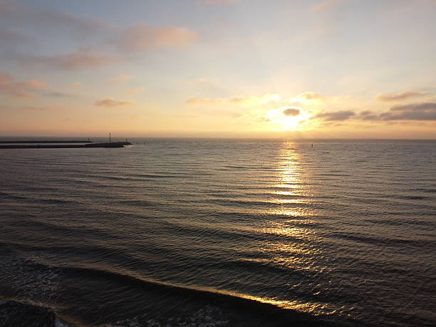 istock Sea sunset from the air 2219206745