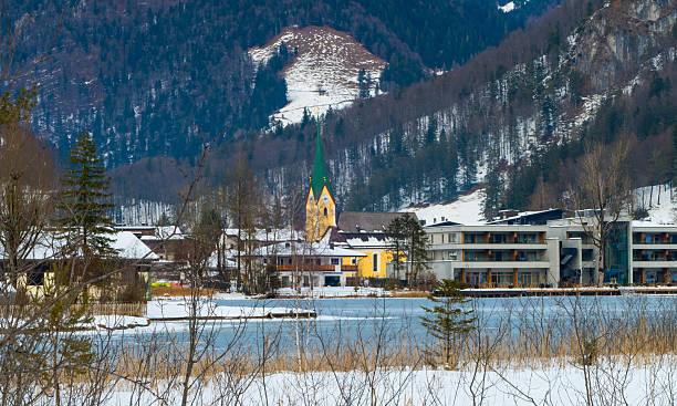 istock Lake and Town of Walchsee Austria 2219209315