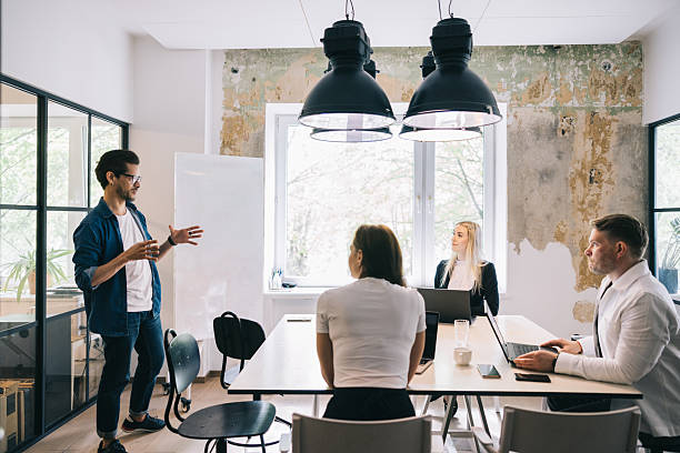 istock Modern Business Meeting in a Creative Industrial Workspace 2219222057