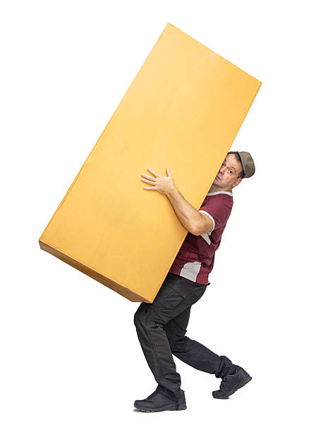 istock Courier delivering a large package, isolated on a white background. 2219223488