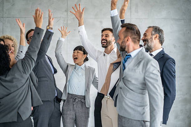 istock Cheerful Business Team Celebrating Success Together Joyfully 2219230626