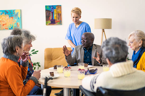 istock Lively pensioners gossiping with each other over refreshments 2219230740