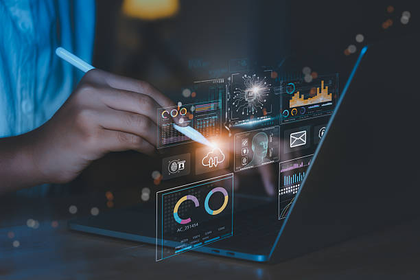 istock business analyst using AI technology, cybersecurity tools, biometric facial recognition, and fintech analytics dashboard to enhance data security, system performance, and financial insight reports. 2219244286