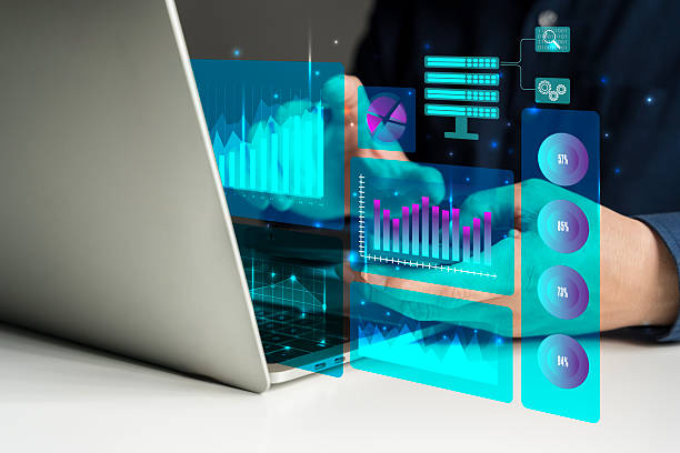 istock Businessman analyzing digital data with futuristic graphs, charts, and technology on virtual interface screen 2219245499