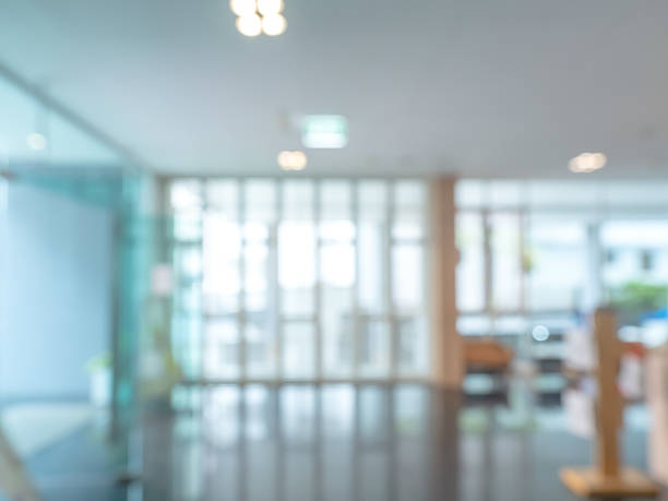 istock Abstract blur luxury hotel background, lobby reception area interior, decoration with with glass partition, lighting, marble floors. Blurred scene interior design, business travel concept. 2219246223