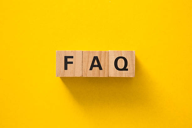 istock Wooden cubes showing faq acronym on yellow background 2219248764