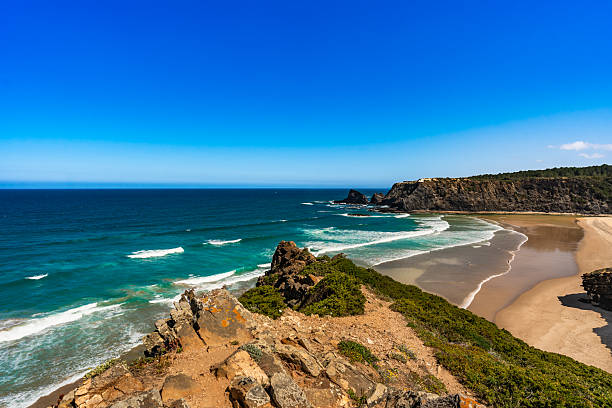 istock Empty Odeceixe beach in Portugal. Beautiful Algarve coastline. View at sandy beach and cliffs 2219249460