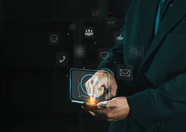 istock Man using smartphone with speech bubble and emoticon icon concept for technology, social media. Notification, communication, digital, business marketing. Ai chat bot technology. application assistant. 2219249588