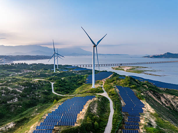 Solar photovoltaic windmill wind energy at sunset