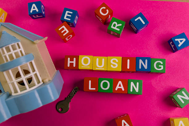 istock Colorful housing loan concept with building model and blocks 2219252252