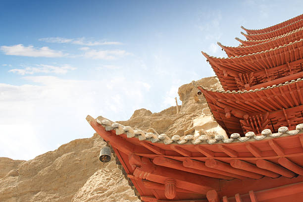 Tourists were visiting crescent lake, the oasis in the desert of Soughing Dunes (Mingshashan) in Dunhuang, Gansu, China