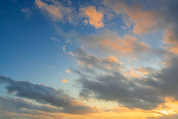 istock Glowing real sky at sunset texture background overlay. Dramatic red and orange clouds. 2219254977
