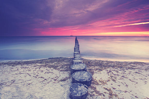 istock autumn at the beach, sunrise at baltic sea 2219259549