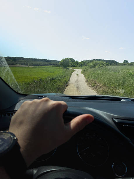 istock Driving on a Scenic Rural Dirt Road 2219260627