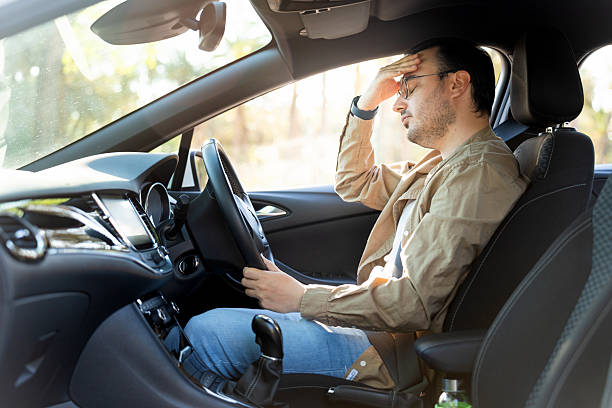 istock Stressed driver experiencing car trouble on road trip 2219260968