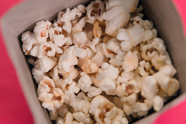 istock Delicious popcorn served in a cozy box for snacking 2219262227