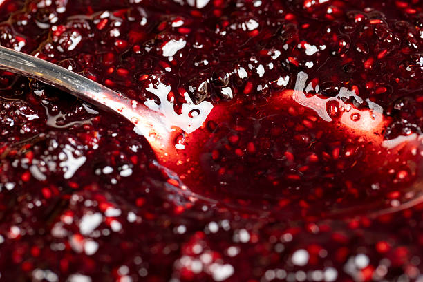 istock Crumpled sweet raspberries with added sugar 2219266434