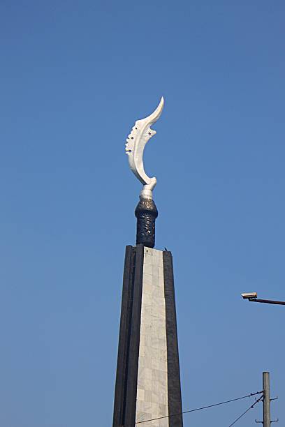 istock Kujang monument under the bright blue sky in Bogor 2219267096