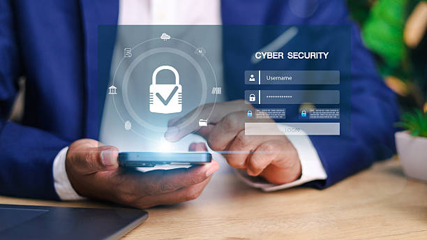 istock Businessman accessing secure login interface on smartphone with digital padlock, cyber security concept, data protection, identity authentication, and online safety. 2219267392