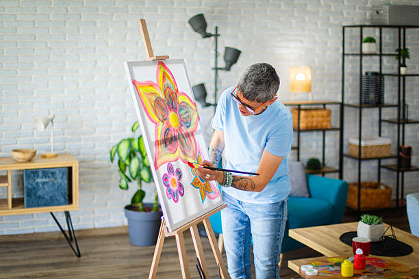 istock Stylish Mature Woman Engaged in Creative Art Activity 2219272938
