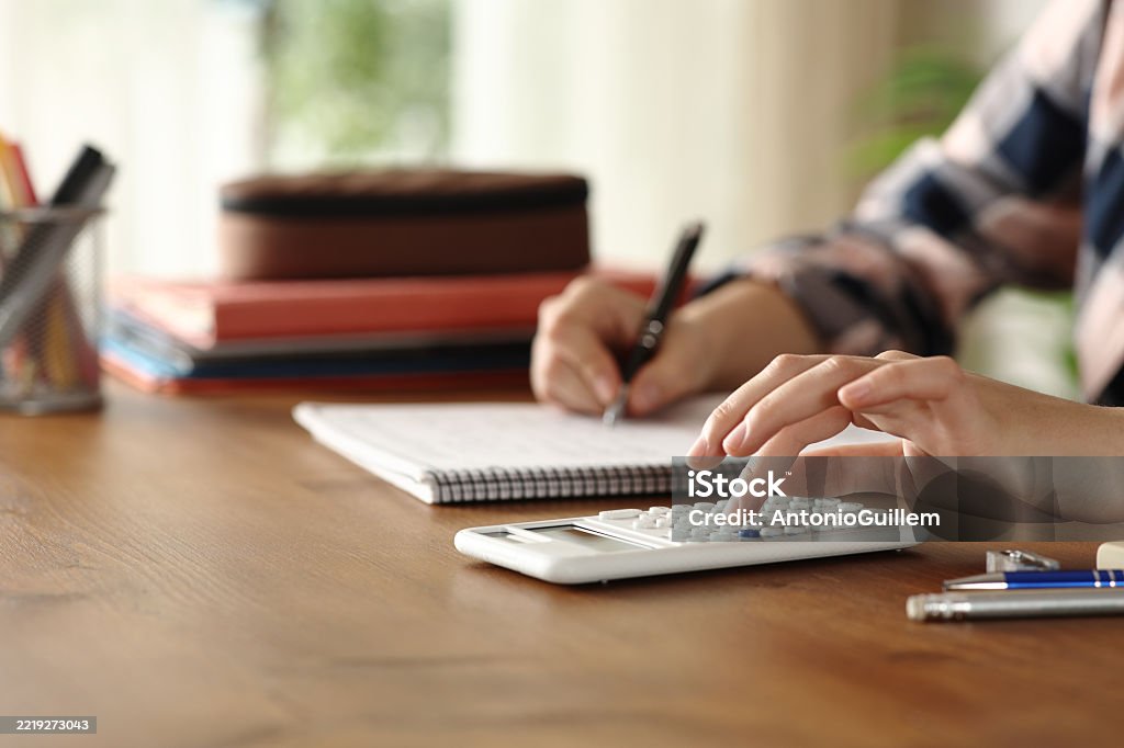 Student Hand Note Student Hand Using Scientific Calculator And Taking Notes Stock Photo ...