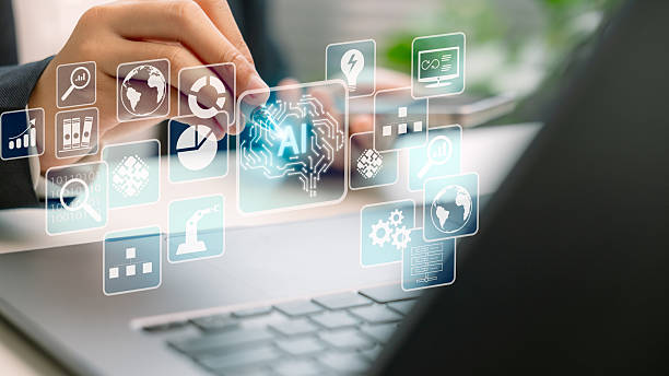 istock Businessmen with virtual AI assistant dashboard icons on a laptop, representing artificial intelligence, data analytics, business automation, digital transformation, and smart decision-making. 2219277147