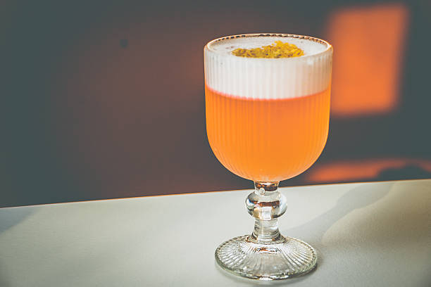 A Coconut Campari cocktail made withCampari, gin, coconut, lemon
