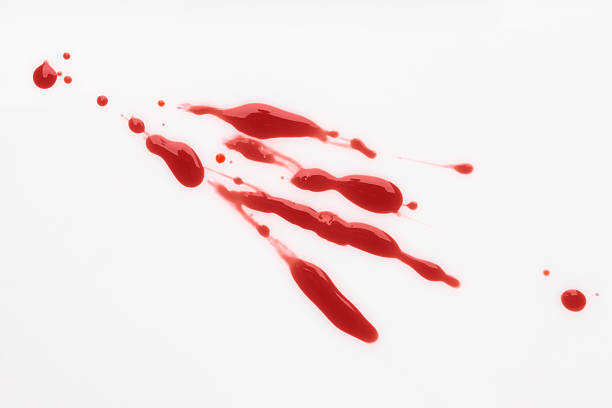 istock Splashes of blood on white background, top view 2219280060