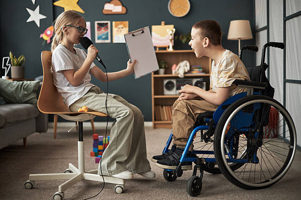 istock Children Engaging in Creative Activities in Living Room 2219280770