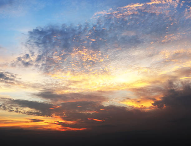 istock Image of dramatic twilight sky and glowing clouds with weather . 2219282947