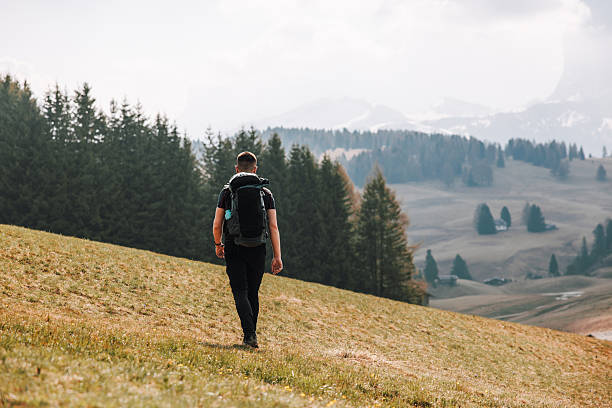 istock Young Man Hiking In Dolomites 2219283713