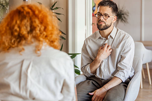 istock Two Individuals Engaged in an Introspective and Thoughtful Discussion in a Cozy Interior 2219284212