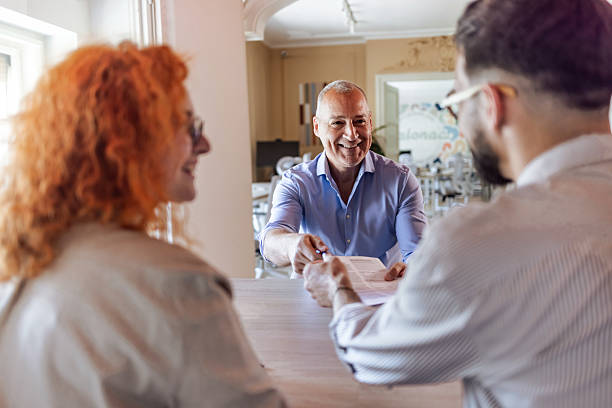 istock Friendly Business Interaction in a Bright Contemporary Office Setting 2219285505