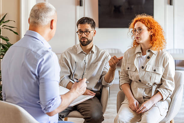 istock Counseling Session With a Couple and a Therapist in a Modern Office 2219286740