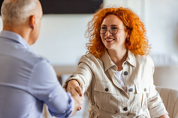 istock Professional Handshake During a Business Meeting in Bright Modern Office 2219286860