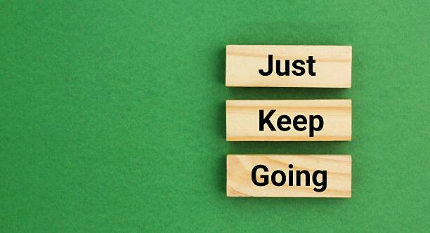 istock Inspirational and motivational words or quotes Just keep going. self development or self improvement. like a mantra, emphasizes perseverance and the importance of not giving up when facing difficulties 2219288396