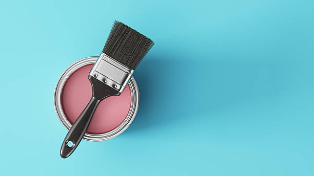 istock Paint Can with paint and Paintbrush on light blue background - Renovation concept - 3d rendering 2219288844