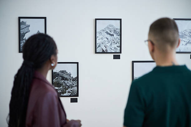 istock Observing Artwork Hanging on Gallery Wall During Exhibition 2219291754