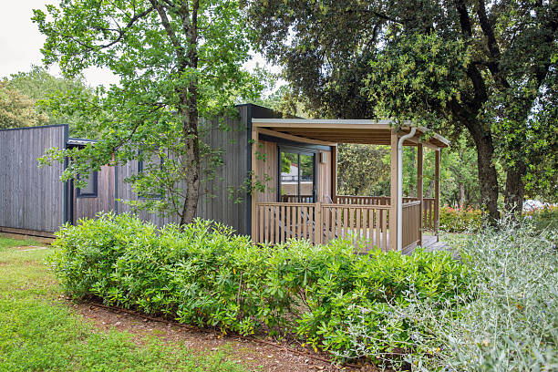 istock Small wooden cabin in forest. 2219293220